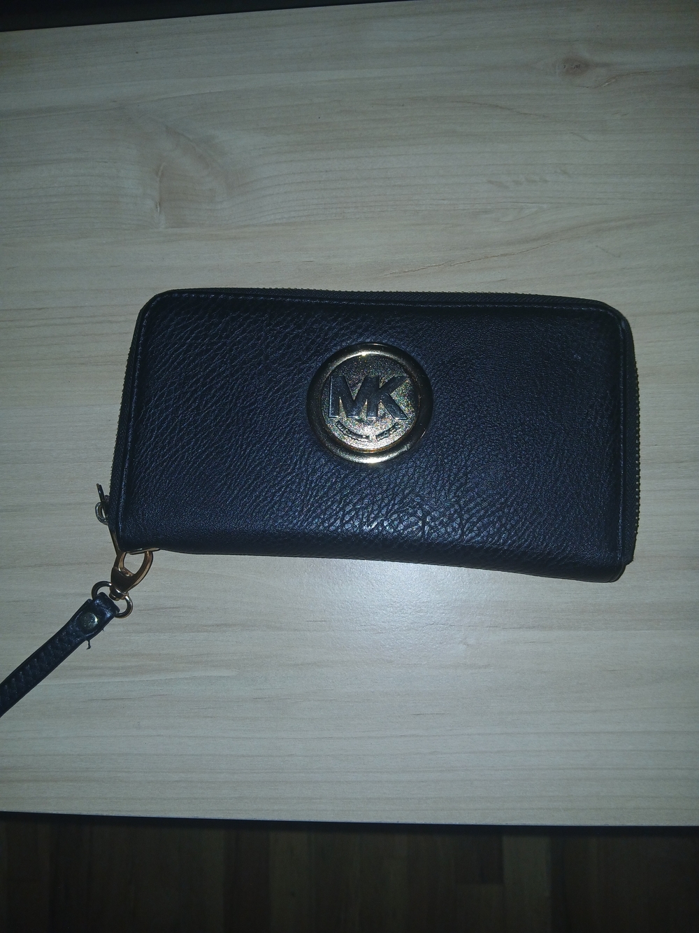 MK Black Leather Zip-Around Wristlet with Gold MK Medallion